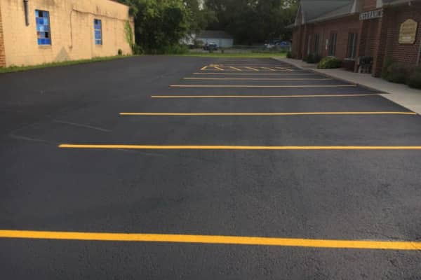 Recently sealed and striped parking lot