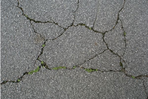 Cracks running through pavement